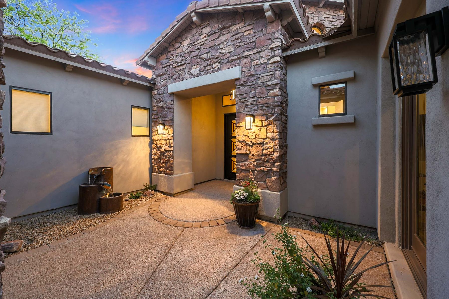 Front courtyard with stone cascade fountain