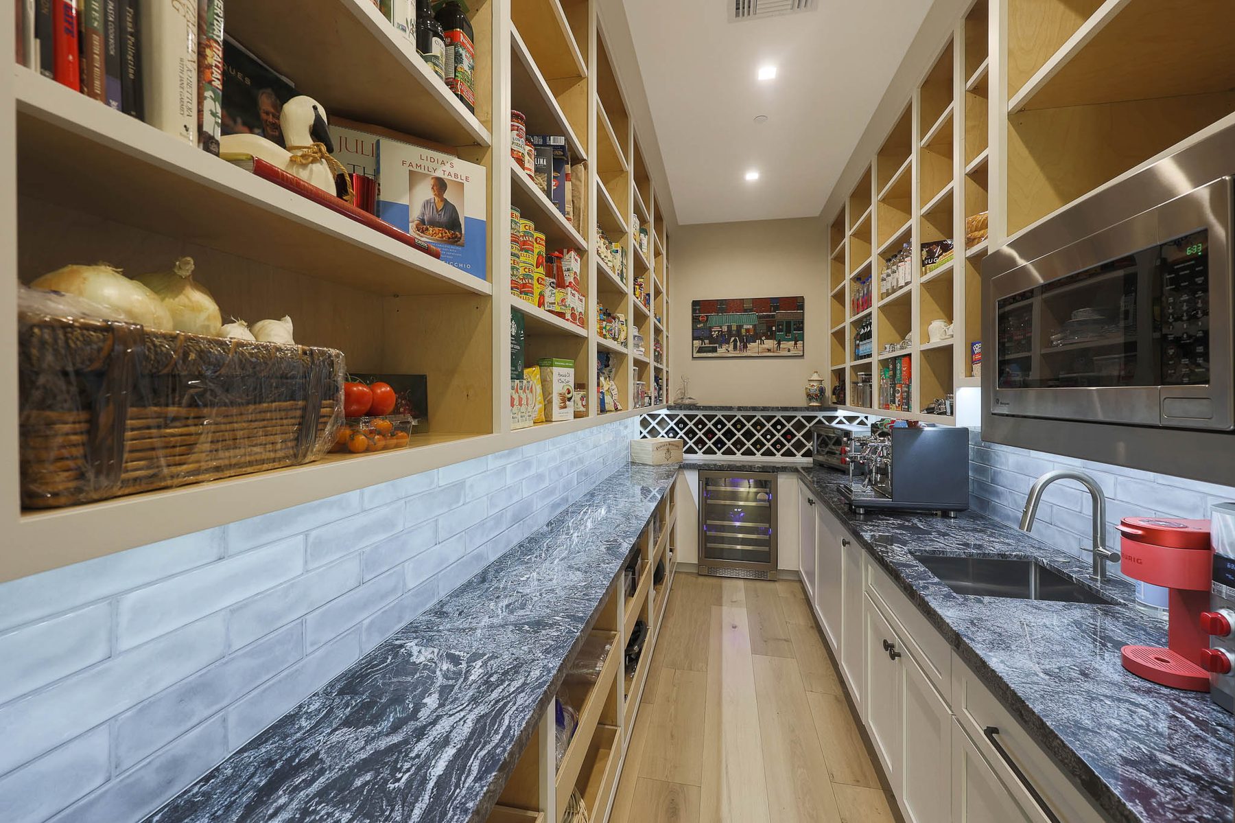 Butler's pantry with Blizzard granite countertops